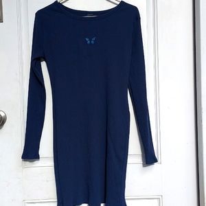 A tight fitting, dark blue dress, size large